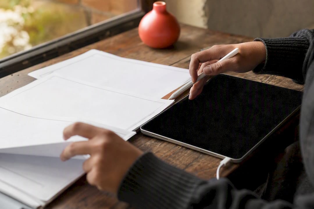 Freelancer reviewing AI-generated project plan off screen